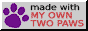 a button that says 'made with my own two paws'
